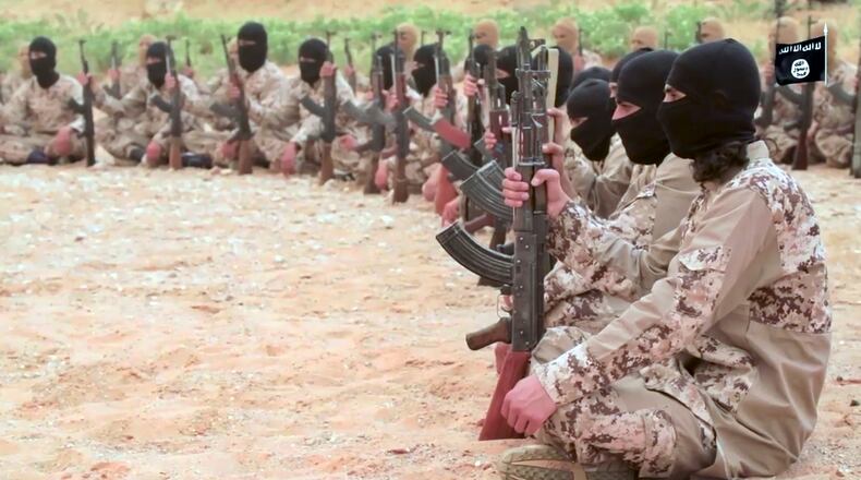An undated frame grab from video posted online Friday, May 19, 2017, by supporters of the Islamic State militant group. (Militant Photo via AP)