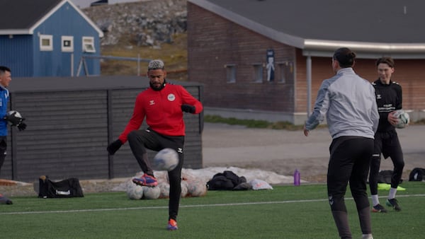Patrick Frederiksen, captain of Greenland's national team, kicks the ball during a training session at Nuuk stadium in Nuuk, Greenland, Tuesday, June 17, 2025. (AP Photo/Kwiyeon Ha)