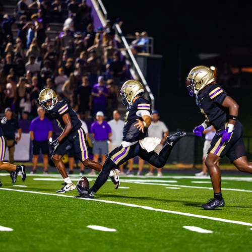 East Coweta kicker Aaron McWilliams (center) converted five of his six field goal attempts on Friday, helping the Indians beat Lithonia 31-14. (Courtesy of Sleeper Media)