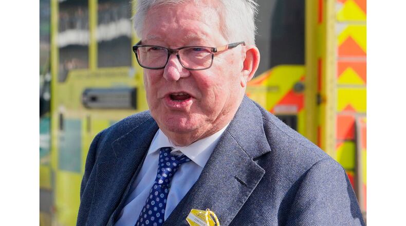 FILE - Former Manchester United soccer manager Alex Ferguson arrives on day four of the 2026 Cheltenham Festival in Cheltenham, England, March 13, 2026. (AP Photo/Dave Shopland, file)