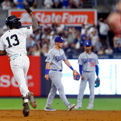 New York Yankees' Jazz Chisholm Jr. reacts running the base after hitting a home run against the Los Angeles Dodgers during the eighth inning of the second game of a baseball doubleheader, Sunday, July 19, 2026 in New York. (AP Photo/Noah K. Murray)
