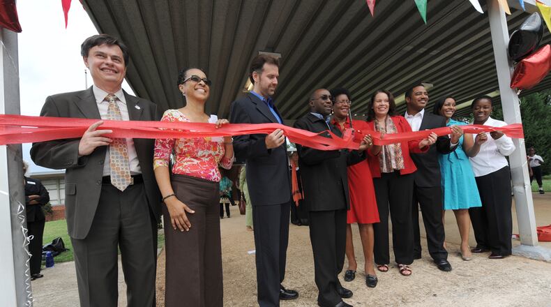 Community leaders, government officials and board members of the DeKalb Preparatory Academy cut a red ribbon to officially open the school in August 2012. The school had one of the biggest increases in progress scores in Georgia on the state’s College and Career Ready Performance Index. AJC FILE PHOTO