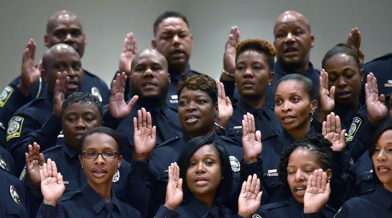 In 2016, Atlanta Public Schools created its own police force and had a swearing in ceremony. HYOSUB SHIN / HSHIN@AJC.COM