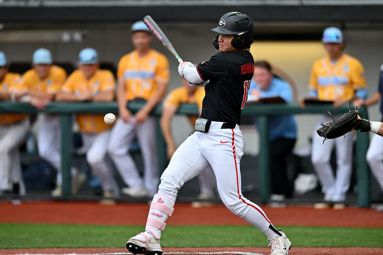 Georgia Kenny Ishikawa (14) hits a single, but advances to third base on a throwing error during the third inning of their NCAA Regional game at Foley Field, Friday, May 29, 2026, in Athens. (Hyosub Shin/AJC)