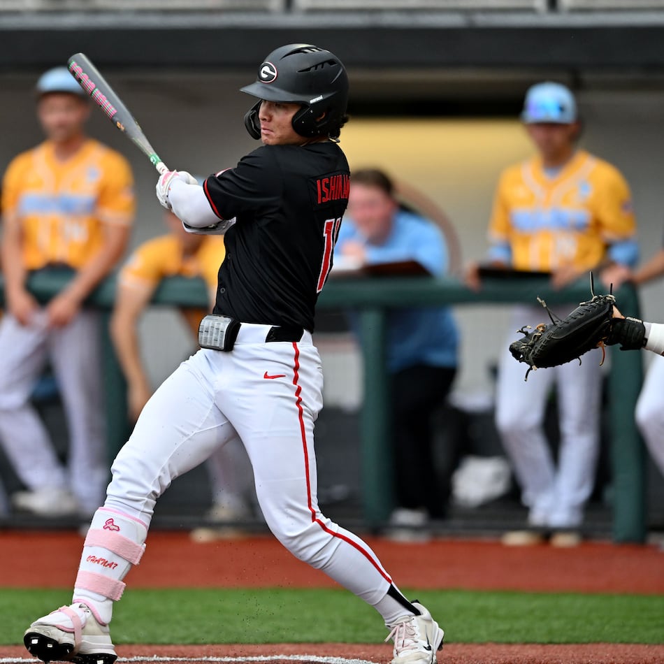 Georgia Kenny Ishikawa (14) hits a single, but advances to third base on a throwing error during the third inning of their NCAA Regional game at Foley Field, Friday, May 29, 2026, in Athens. (Hyosub Shin/AJC)