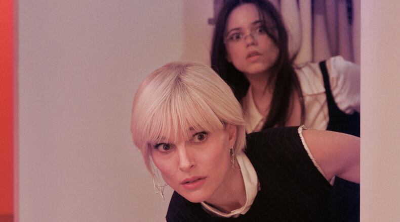 Natalie Portman, foreground, and Jenna Ortega appear in a scene from "The Gallerist," an official selection of the 2026 Sundance Film Festival. (MRC II Distribution Company L.P./Sundance Institute via AP)