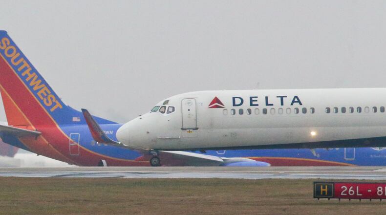 A proposed class-action antitrust lawsuit filed by airline consumers alleges the airlines colluded to limit airline flying in a conspiracy to fix domestic fares, and that airline consumers paid artificially inflated ticket prices as a result. JOHN SPINK / JSPINK@AJC.COM