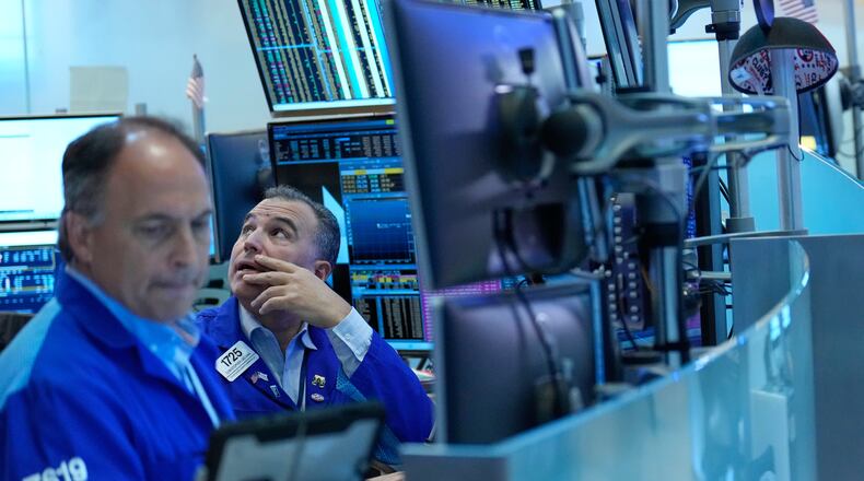 Christopher Lagana works on the floor at the New York Stock Exchange in New York, Monday, Sept. 14, 2026. (AP Photo/Seth Wenig)