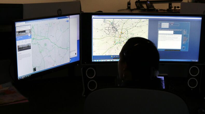 The Georgia Department of Transportation will monitor Super Bowl traffic at its Transportation Management Center in Atlanta. GDOT and other agencies use cameras and stoplight pre-emption to keep traffic moving. EMILY HANEY / emily.haney@ajc.com