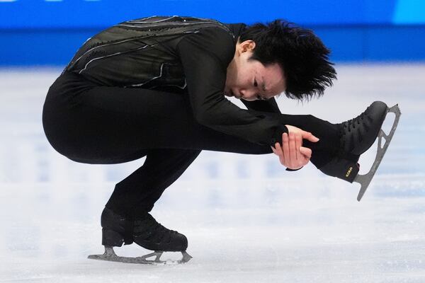Yuma Kagiyama, of Japan, skates during the men's short program at the figure skating world championships, Thursday, March 27, 2025, in Boston. (AP Photo/Charles Krupa)