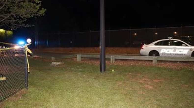 An officer discovered the bodies Saturday evening while patrolling a Gwinnett County park.