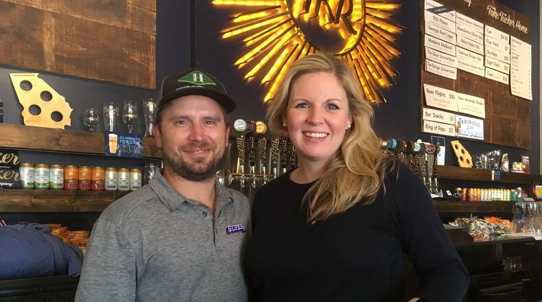 Tucker Brewing head brewmaster Tucker Eagleson (left) and  co-founder Ashley Chapman Hubbard. CONTRIBUTED BY BOB TOWNSEND