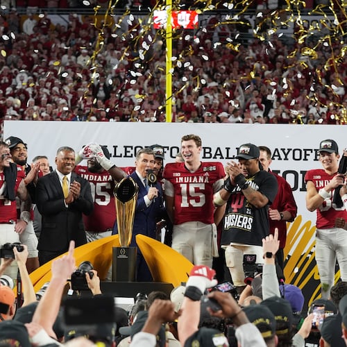 FILE - Indiana quarterback Fernando Mendoza (15) is interviewed during the trophy ceremony after Indiana defeated Miami in a College Football Playoff national championship game, Jan. 19, 2026, in Miami Gardens, Fla. (AP Photo/Lynne Sladky, File)