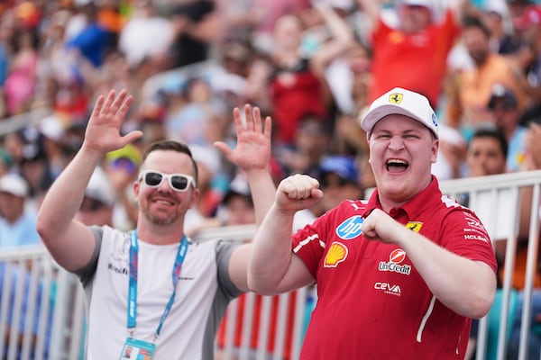 Fans cheer during the Sprint race at the Formula One Miami Grand Prix auto race, Saturday, May 3, 2025, in Miami Gardens, Fla. (AP Photo/Rebecca Blackwell)