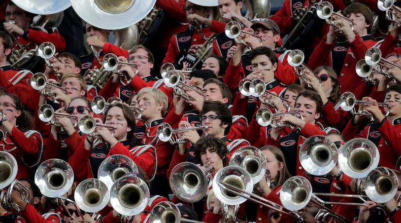 Members of the Georgia Redcoats Band performs prior to the start of a game against Auburn in Auburn, Ala.