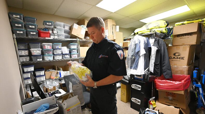 Paul Beamon, vice president of emergency medical services at AmeriPro EMS, unpacks supplies including a box of respirators bought from a local store, at AmeriPro EMS in Riverdale on Wednesday, March 18, 2020. As Atlanta falls deeper into the grips of the coronavirus pandemic, medical professionals are having trouble finding enough supplies and equipment to treat patients and protect health care providers.  (Hyosub Shin / Hyosub.Shin@ajc.com)