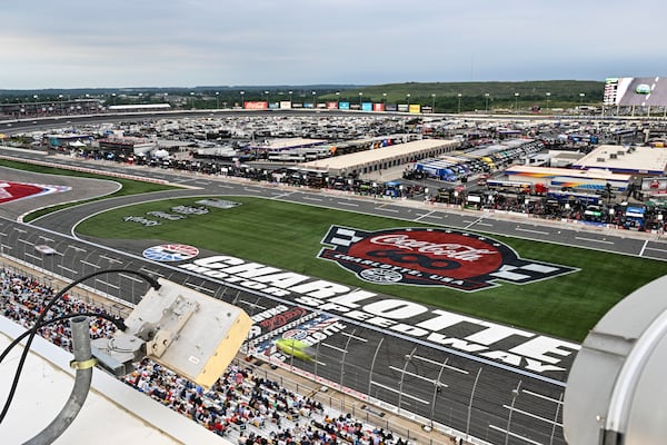 Drivers compete down the front stretch during a NASCAR Cup Series auto race at Charlotte Motor Speedway, Sunday, May 25, 2025, in Concord, N.C. (AP Photo/Matt Kelley)