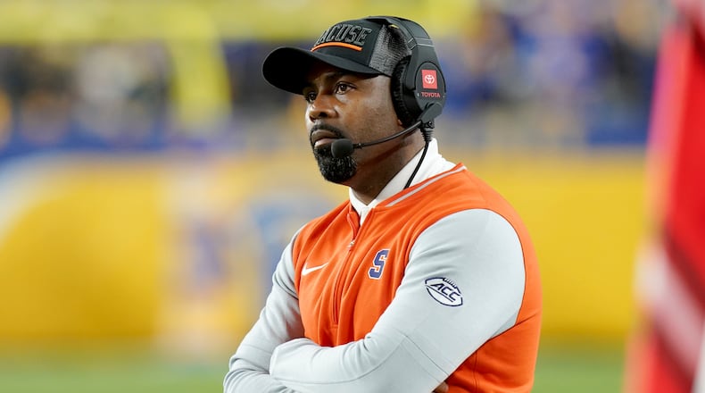 Syracuse head coach Fran Brown watches the first half of an NCAA college football game against Pittsburgh, Thursday, Oct. 24, 2024, in Pittsburgh. (AP Photo/Matt Freed)