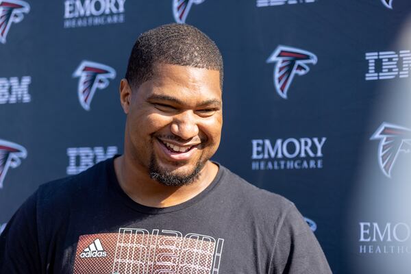 Calais Campbell (93) speaks to media at Atlanta Falcons training camp in Flowery Branch on Tuesday, July 25, 2023. (Arvin Temkar / arvin.temkar@ajc.com)
