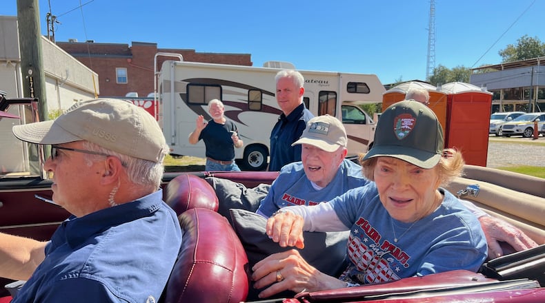 Former President Jimmy Carter and former First Lady Rosalynn Carter make their way through Plains for the annual Peanut Festival. (Photo: Jill Stuckey)