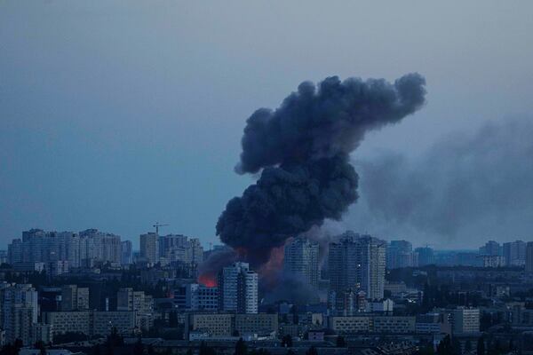 Smoke rises after a Russian air strike on Kyiv, Ukraine, on Friday, June 6, 2025. (AP Photo/Evgeniy Maloletka)