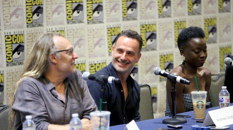 SAN DIEGO, CA - JULY 20:  (L-R) Greg Nicotero, Andrew Lincoln, and Danai Gurira speak at The Walking Dead Press Conference during Comic Con 2018 on July 20, 2018 in San Diego, California.  (Photo by Jesse Grant/Getty Images for AMC)