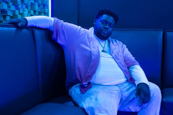 Rapper and metro Atlanta resident Swayvo Twain keeps his parents’ respective, and equally influential, musical legacies close. Despite her long and groundbreaking career, Swayvo felt like his mom wasn’t always valued in the music business. (Arvin Temkar/AJC)
