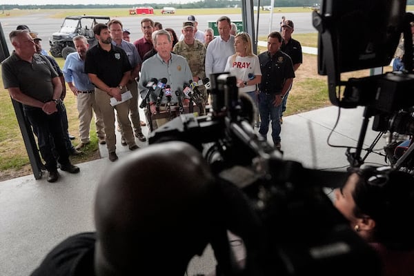 Gov. Brian Kemp speaks on the fires in Southeast Georgia on Friday. (Mike Stewart/AP)