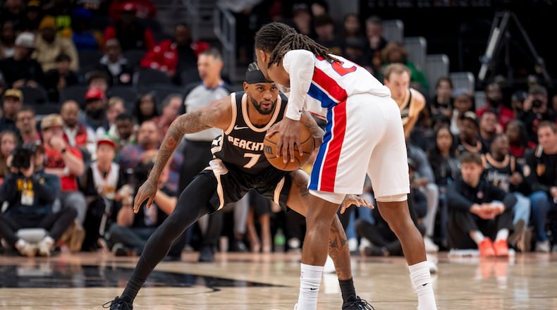 Atlanta Hawks guard Nickeil Alexander-Walker (7) defends the goal against Detroit Pistons guard Daniss Jenkins during the first half of an NBA basketball game, Tuesday, Nov. 18, 2025, in Atlanta. (Erik Rank/AP)