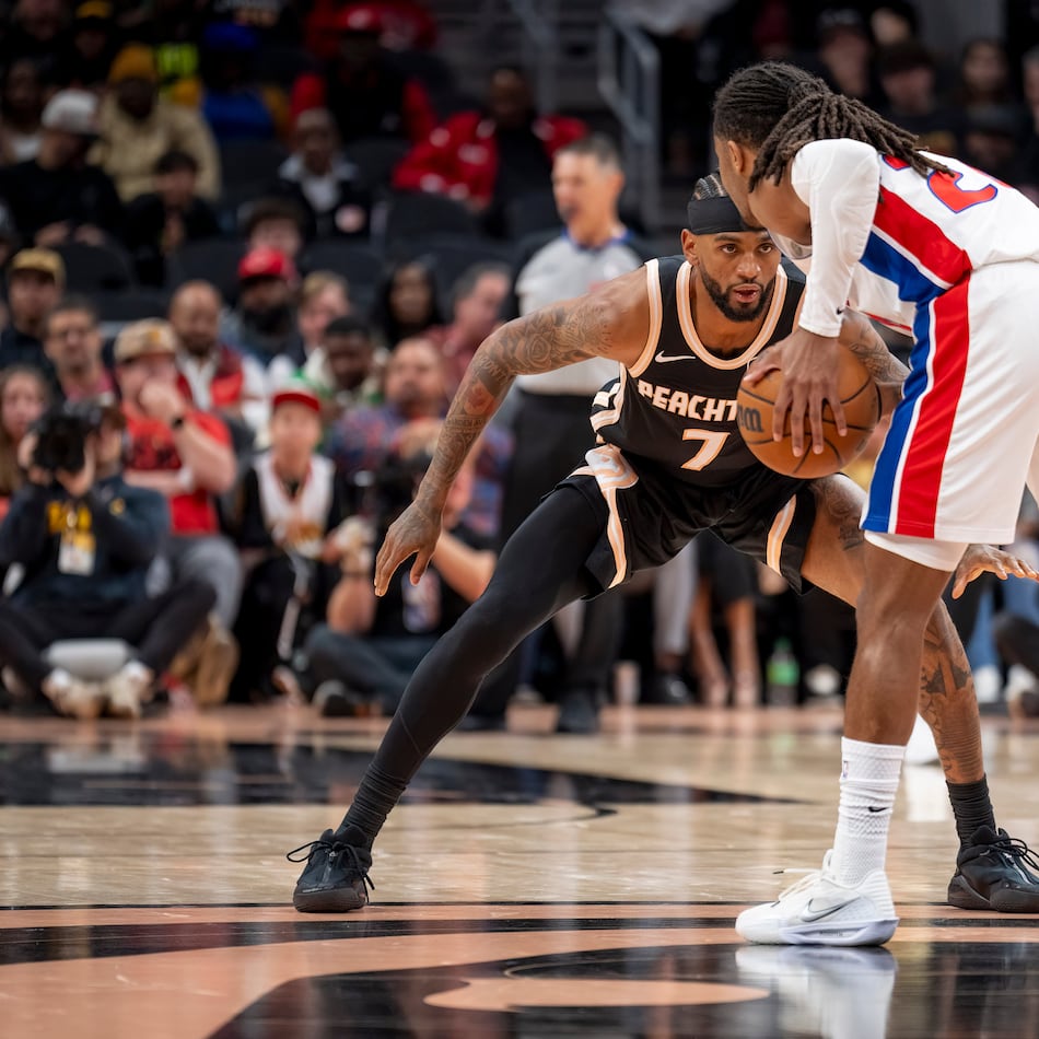 Atlanta Hawks guard Nickeil Alexander-Walker (7) defends the goal against Detroit Pistons guard Daniss Jenkins during the first half of an NBA basketball game, Tuesday, Nov. 18, 2025, in Atlanta. (Erik Rank/AP)