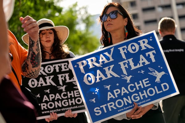 FILE - Members of Apache and others who want to halt a massive copper mining project on federal land in Arizona gather outside the U.S. District Court, May 7, 2025, in Phoenix. (AP Photo/Matt York, File)