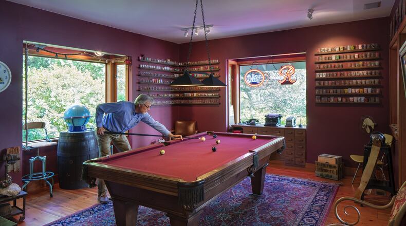 The Johnsons pool room holds one of Mark s prized collections along its walls: 450 purposefully inappropriate shot glasses from the 1940s-60s. I guess that s art, he says. They re all politically incorrect: sexual innuendo, politics, naked ladies. I stopped collecting because I can t find them anymore. (Steve Ringman/Seattle Times/TNS)
