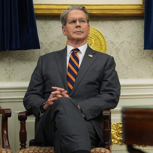 Treasury Secretary Scott Bessent listens as President Donald Trump talks after meeting with New York City Mayor-elect Zohran Mamdani in the Oval Office of the White House, Friday, Nov. 21, 2025, in Washington. (AP Photo/Evan Vucci)