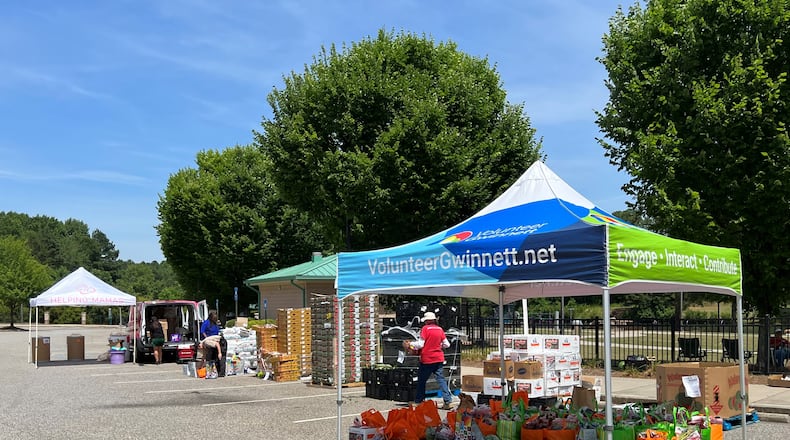 Volunteers prepare food from the Atlanta Food Bank for Gwinnett's Mobile Food Distribution program. (Courtesy Gwinnett County)