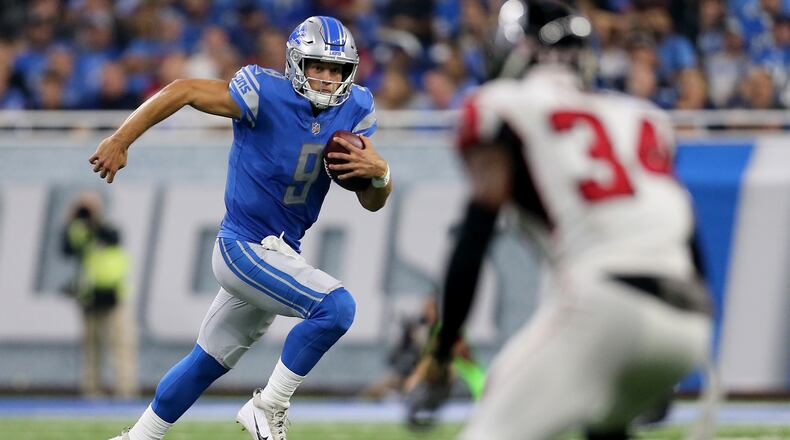 DETROIT, MI - SEPTEMBER 24: Quarterback Matthew Stafford #9 of the Detroit Lions runs with the ball against the Atlanta Falcons during the second half at Ford Field on September 24, 2017 in Detroit, Michigan. (Photo by Rey Del Rio/Getty Images)