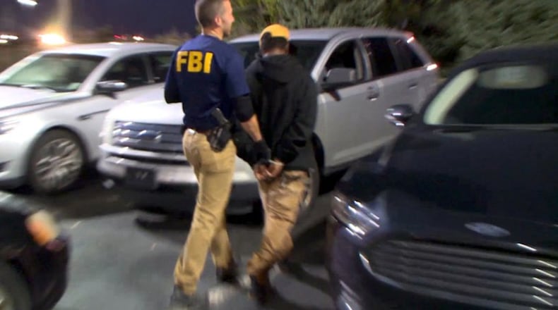 Sixteen people were arrested and a child was rescued in the sting. (Credit: FBI)