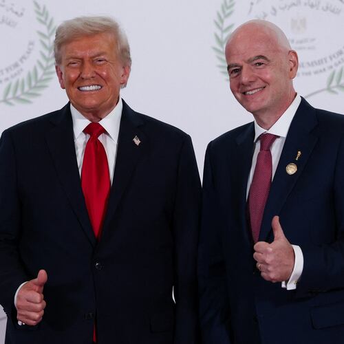 President Donald Trump and FIFA president Gianni Infantino pose for a photo in Sharm el-Sheikh, Egypt, Monday, Oct. 13, 2025. (Suzanne Plunkett, Pool Photo via AP)