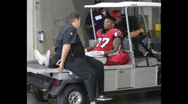 Atlanta Falcons safety Ricardo Allen leaves the game with an injury during the second half against the New Orleans Saints in an NFL football game, Sunday, Sept 23, 2018, in Atlanta. (Curtis Compton/Atlanta Journal-Constitution via AP))