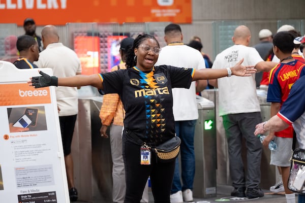 Visitors say helpful MARTA employees on the ground have been a bright spot in their World Cup experience. (Ben Gray/AJC)