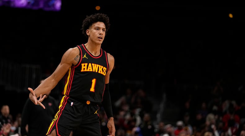 Atlanta Hawks forward Jalen Johnson (1) reacts after he scores in the first half of an NBA basketball game against the New York Knicks, Wednesday, Nov. 15, 2023, in Atlanta. (AP Photo/Brynn Anderson)