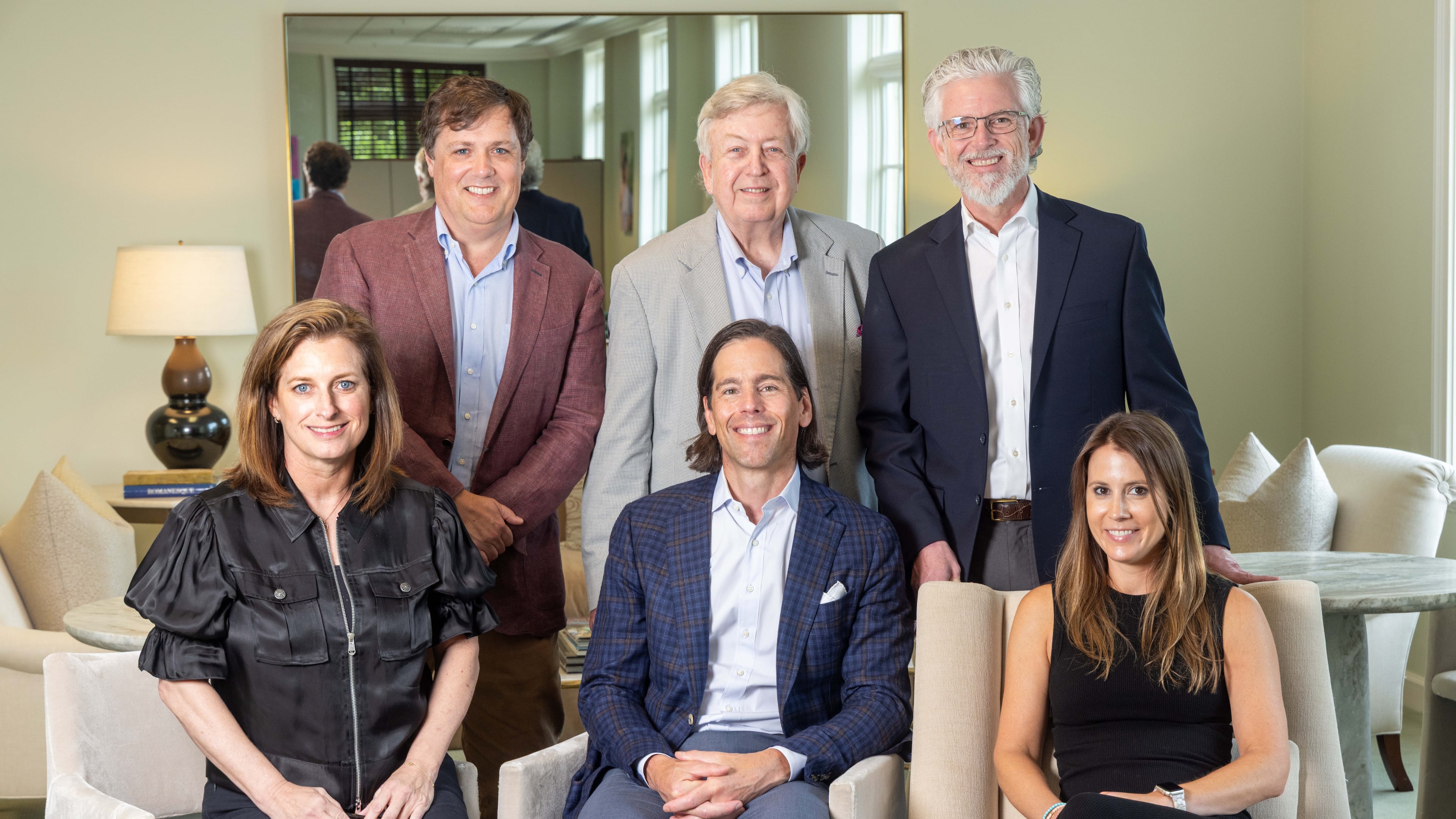 The Dorsey Alston Realtors leadership team is (front row, from left) Jenny Hart, Michael M. Rogers and Kristen Gordon, plus (back row, from left) Patrick Wood, Rip Sartain and Carson Matthews. (Phil Skinner for the AJC)