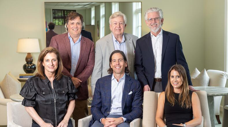 The Dorsey Alston Realtors leadership team is (front row, from left) Jenny Hart, Michael M. Rogers and Kristen Gordon, plus (back row, from left) Patrick Wood, Rip Sartain and Carson Matthews. (Phil Skinner for the AJC)