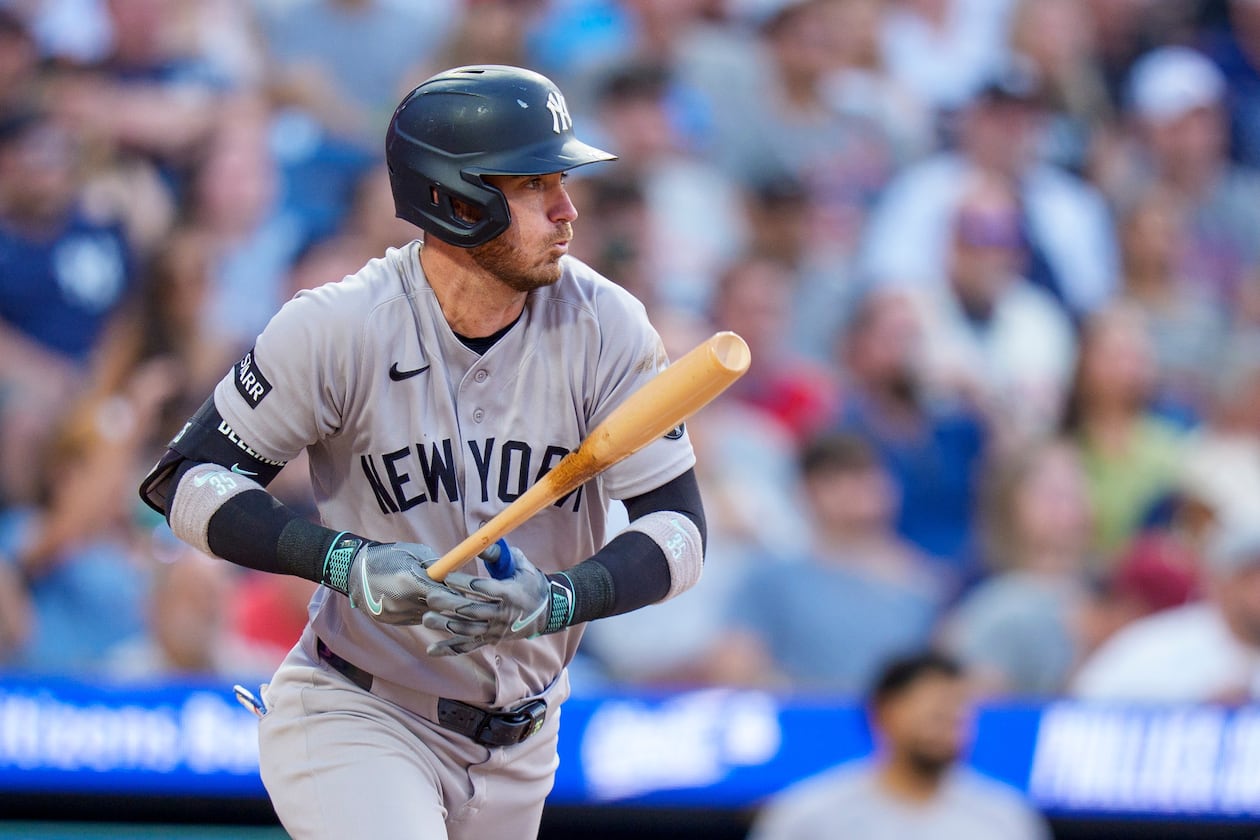 New York Yankees' Cody Bellinger singles to score Austin Wells during the sixth inning of a baseball game against the Philadelphia Phillies, Saturday, July 25, 2026, in Philadelphia. (AP Photo/Chris Szagola)