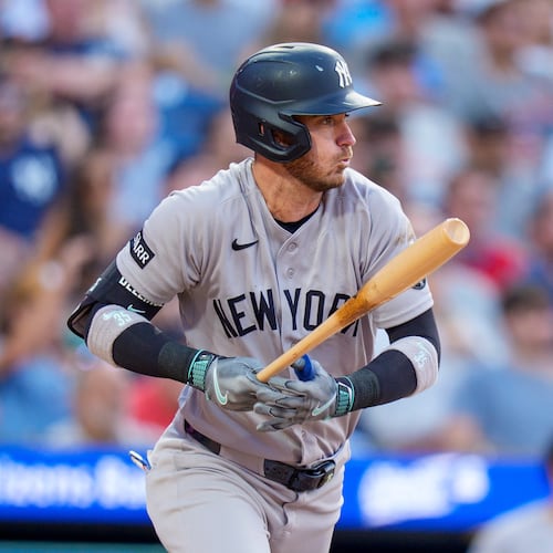 New York Yankees' Cody Bellinger singles to score Austin Wells during the sixth inning of a baseball game against the Philadelphia Phillies, Saturday, July 25, 2026, in Philadelphia. (AP Photo/Chris Szagola)