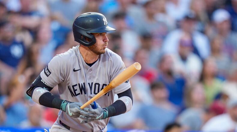 New York Yankees' Cody Bellinger singles to score Austin Wells during the sixth inning of a baseball game against the Philadelphia Phillies, Saturday, July 25, 2026, in Philadelphia. (AP Photo/Chris Szagola)