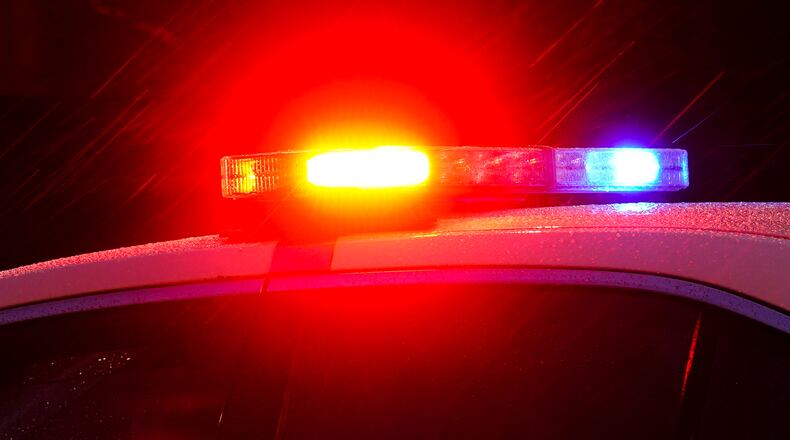 FILE - Lights flash on top of a police car in Philadelphia, Jan. 17, 2022. (AP Photo/Matt Rourke, File)