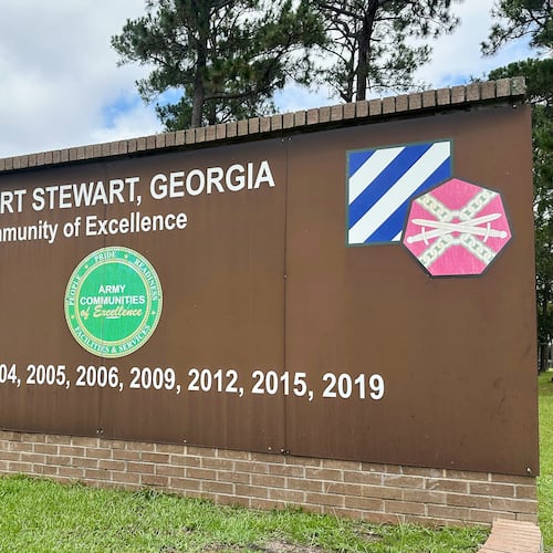 FILE - A sign stands outside the main gate of Fort Stewart, Ga., Aug. 6, 2025. (AP Photo/Russ Bynum, File)