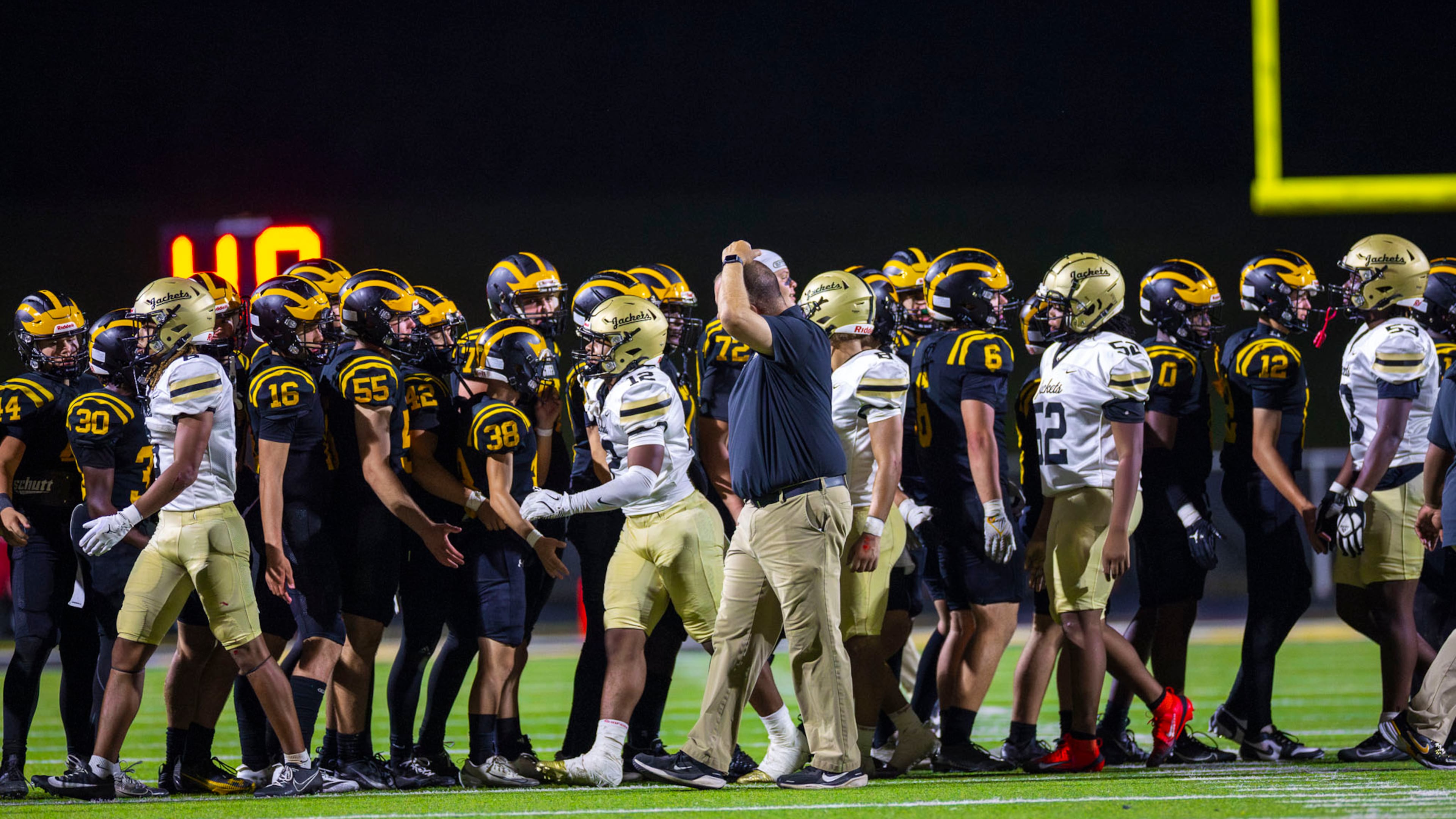 Sequoyah and Sprayberry players shake hands after the Chiefs defeated the Yellow Jackets 63-20 on Sept. 12, 2025, Sprayberry's lone loss of the season. Sequoyah won Class 5A Region 6 and hosts Coffee in the first round Friday, while Sprayberry hosts Lee County. (Oscar Guevara Saenz for the AJC)
