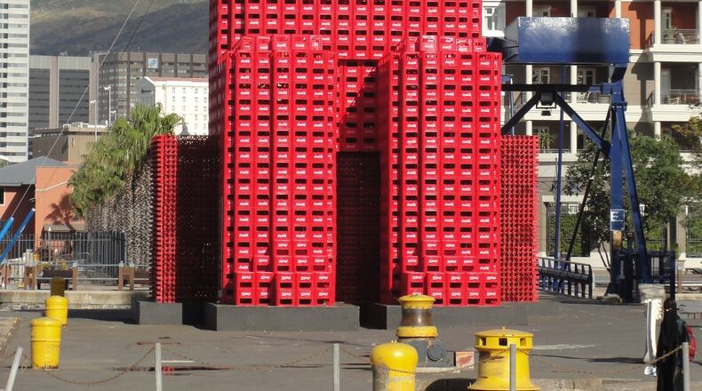 Bill Abernethy took this photo of what he called a “Lego Man” in Cape Town South Africa. Made from cases of Coca-Cola this tourist attraction was just one of many wonders in the area. Cape Town is fondly known as the Mother City. With jaw-dropping scenery to centuries-old architecture mingling with minimalist modern design, this scenic South African city encompasses old and new. The city is set against the backdrop of the iconic Table Mountain plateau and sapphire blue Table Bay, famous for its seal population and great white sharks.