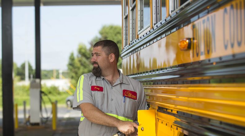 Metro Atlanta school districts have largely been able to absorb increased fuel costs so far. (Alyssa Pointer/AJC file photo)